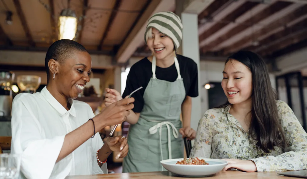 Staff Training - How Proper Staff Training Can Transform Your Restaurant - Restaurant staff chatting