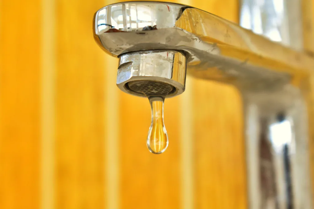 energy conservation tips - 11 Energy Conservation Tips for Restaurants - water dripping from a leaky tap. 